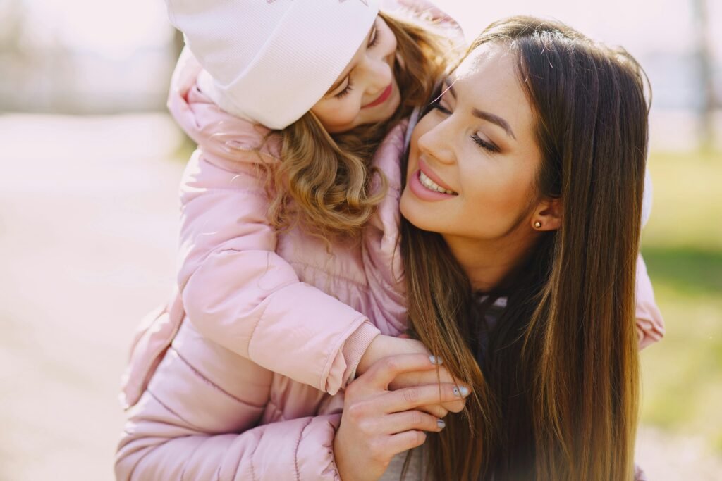 Daughter climbing on mother. Calm scripts
