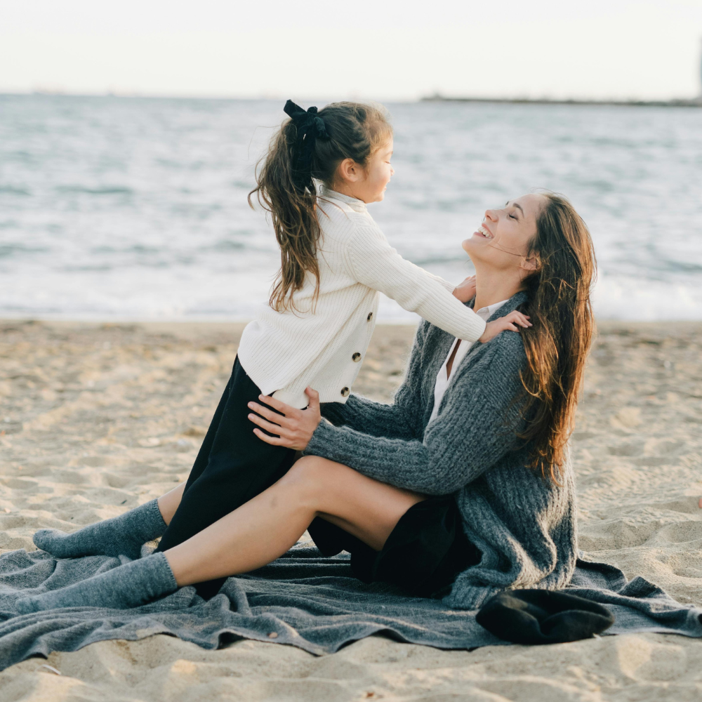 Gentle vs. Winging -It Parenting, mother and daughter on the beach