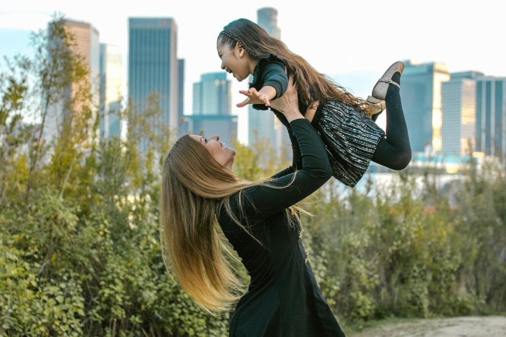 loving mother playing with her daughter