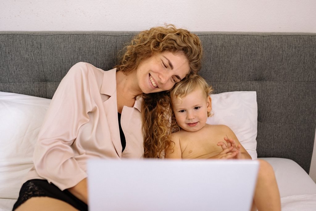 Parent and toddler during screen time