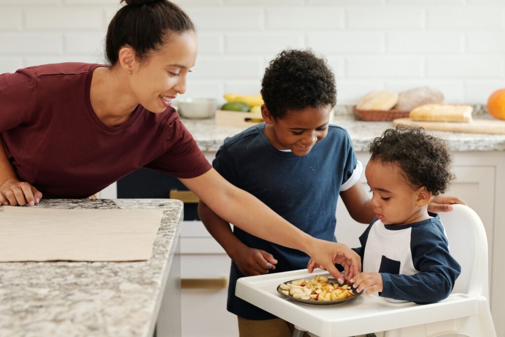 Parent and toddler using playful connection during an everyday routine