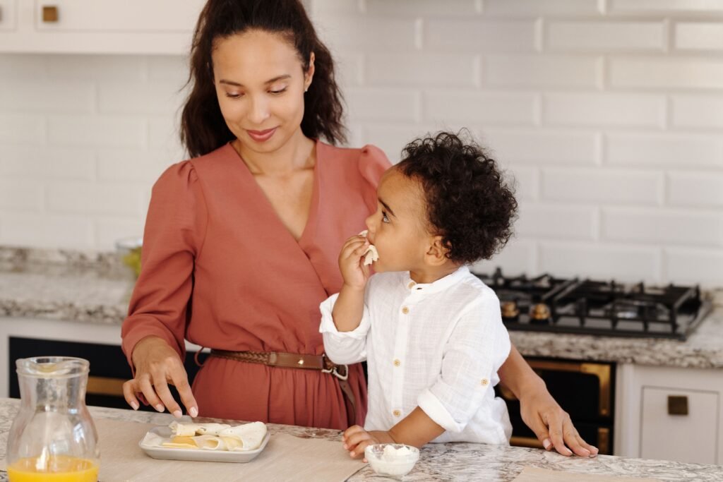 Parent and young child reconnecting quietly after a hard day