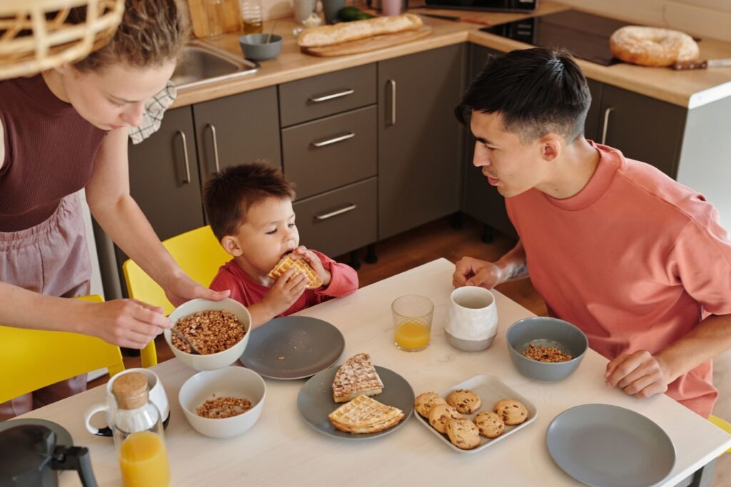 Young child practicing an everyday task with calm adult support